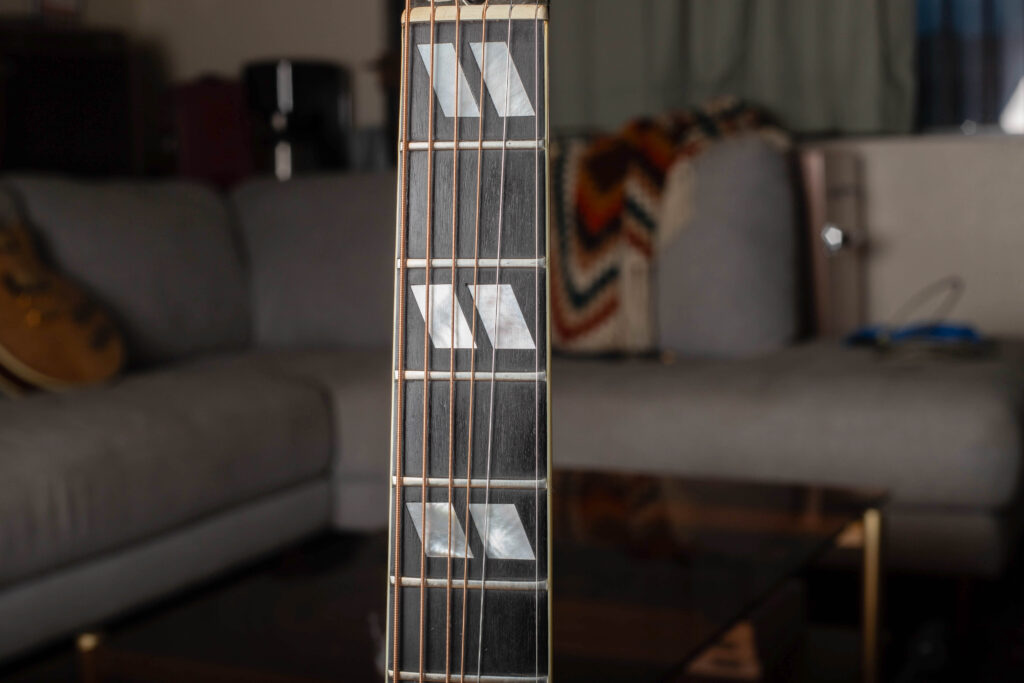 Close-up of the split-parallelogram mother of pearl inlays