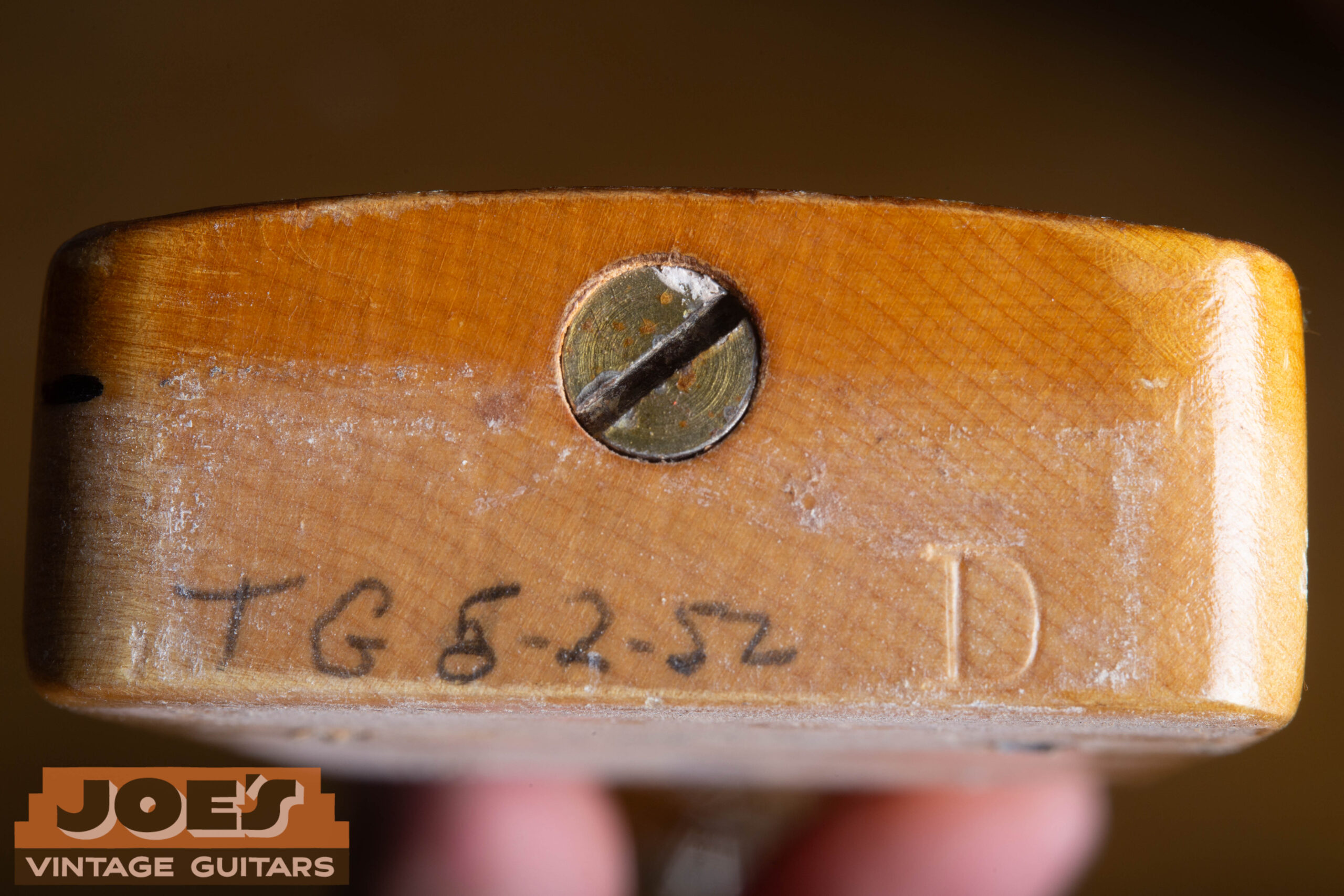 Pencil date on the neck heel of a 1952 Fender Precision Bass