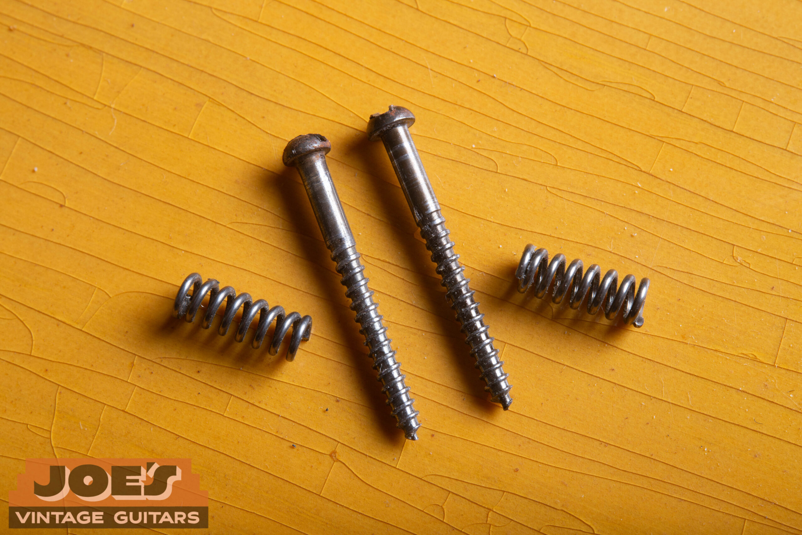 Pickup mounting screws and springs on a 1952 Fender Precision Bass