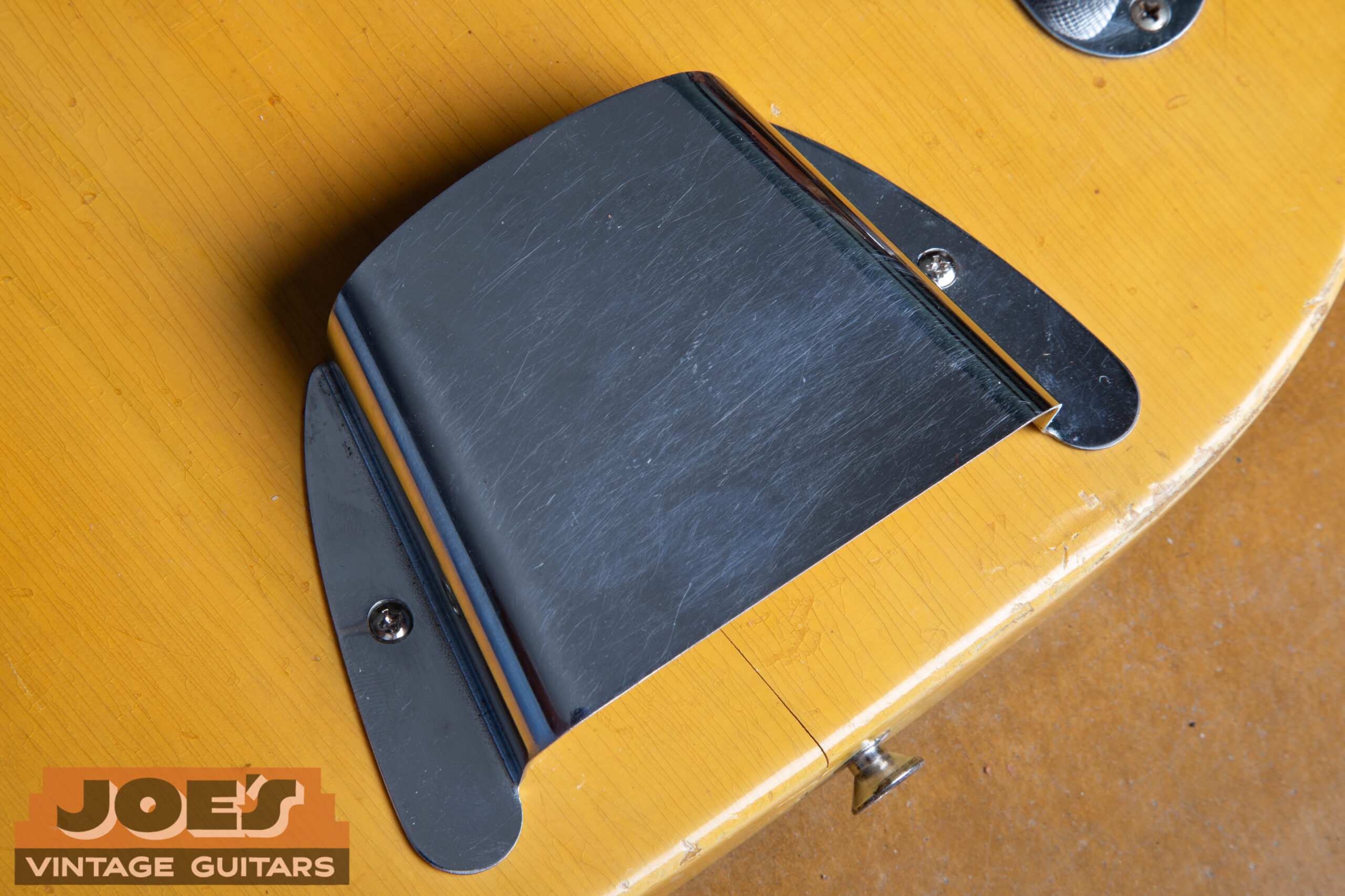 Bridge cover on a 1953 Fender Precision Bass