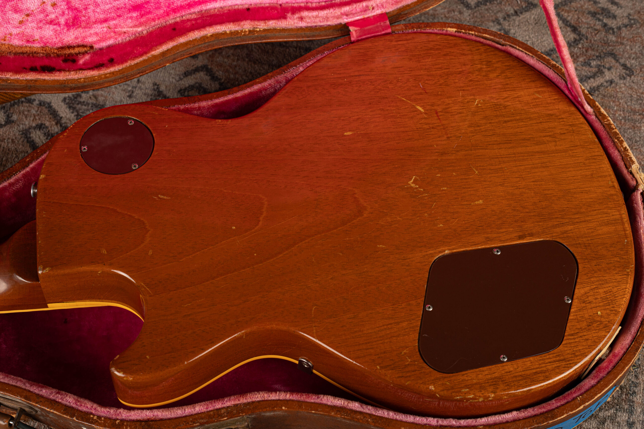 1954 Gibson Les Paul Goldtop back of body showing mahogany construction, brown stain finish, and dual control cavity cover plates