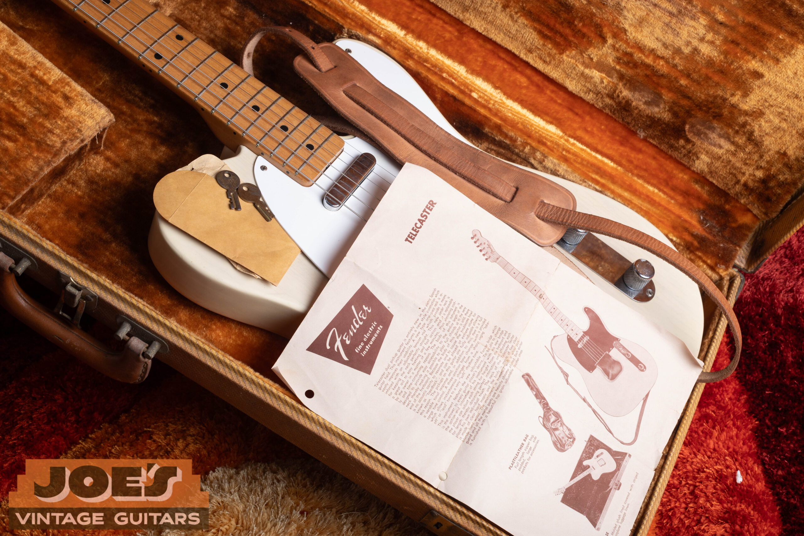 1959 Fender Telecaster original case candy including strap, case key, and paperwork — rare surviving accessories that confirm original ownership history