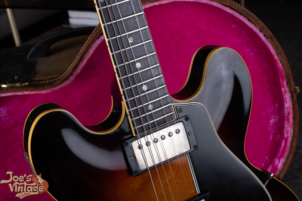Close-up of original Brazilian rosewood fingerboard with classic pearloid dot inlays on a 1959 Gibson ES-335 vintage guitar.