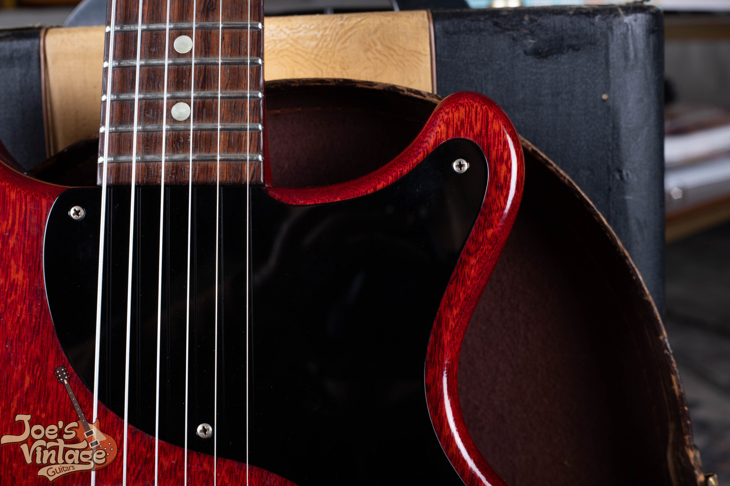 1959 Gibson Les Paul Junior with original black pickguard — a documented factory variation on cherry-finish double-cutaway models