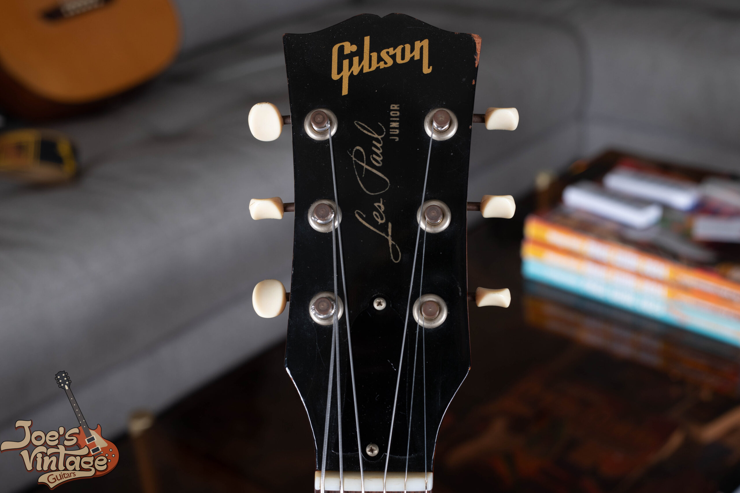 1959 Gibson Les Paul Junior headstock — silk-screened Gibson logo and Les Paul Junior designation in gold ink