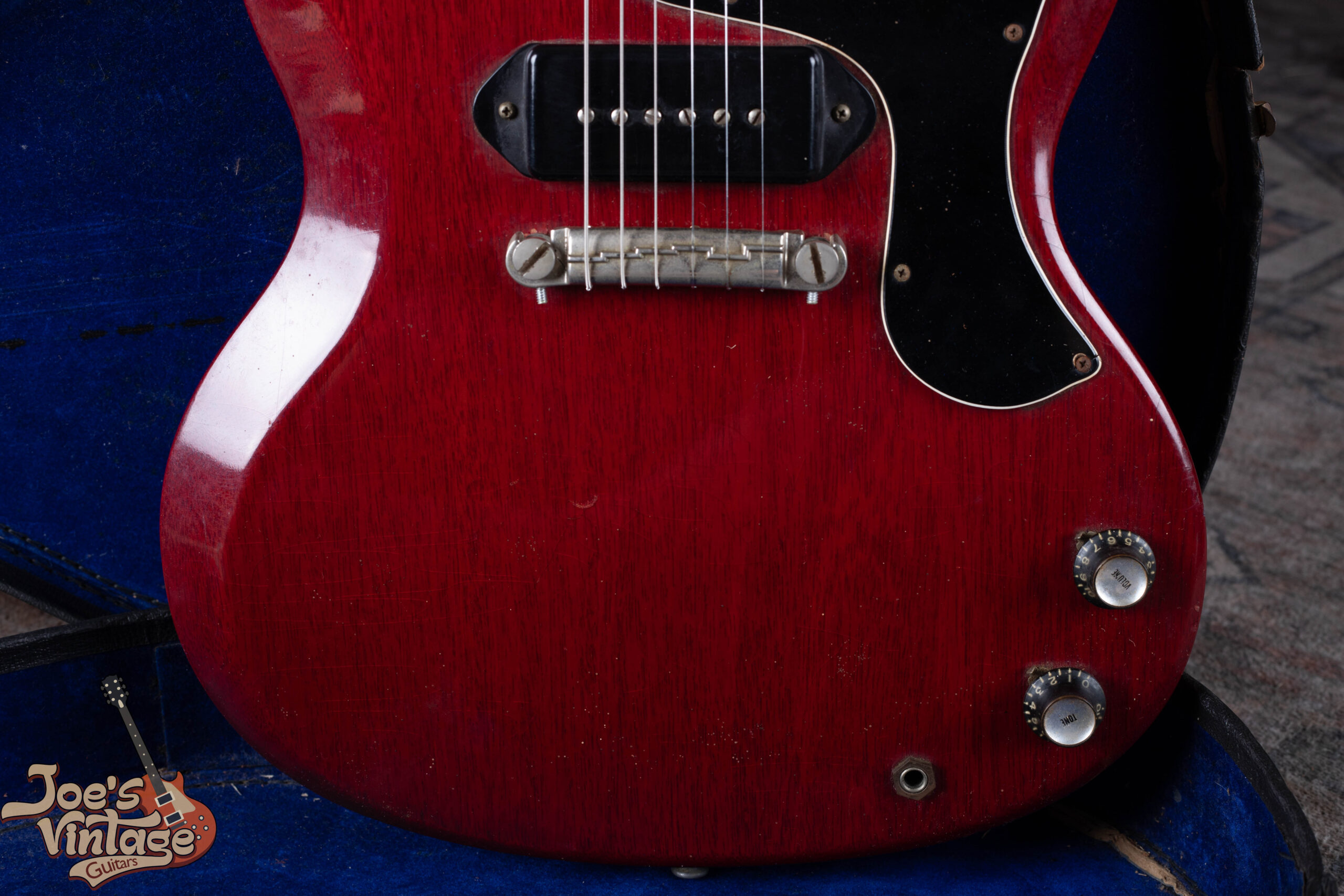 Lightning bar wraparound bridge on a 1960s SG Junior — the direct-coupling design that contributes to the Junior's percussive attack