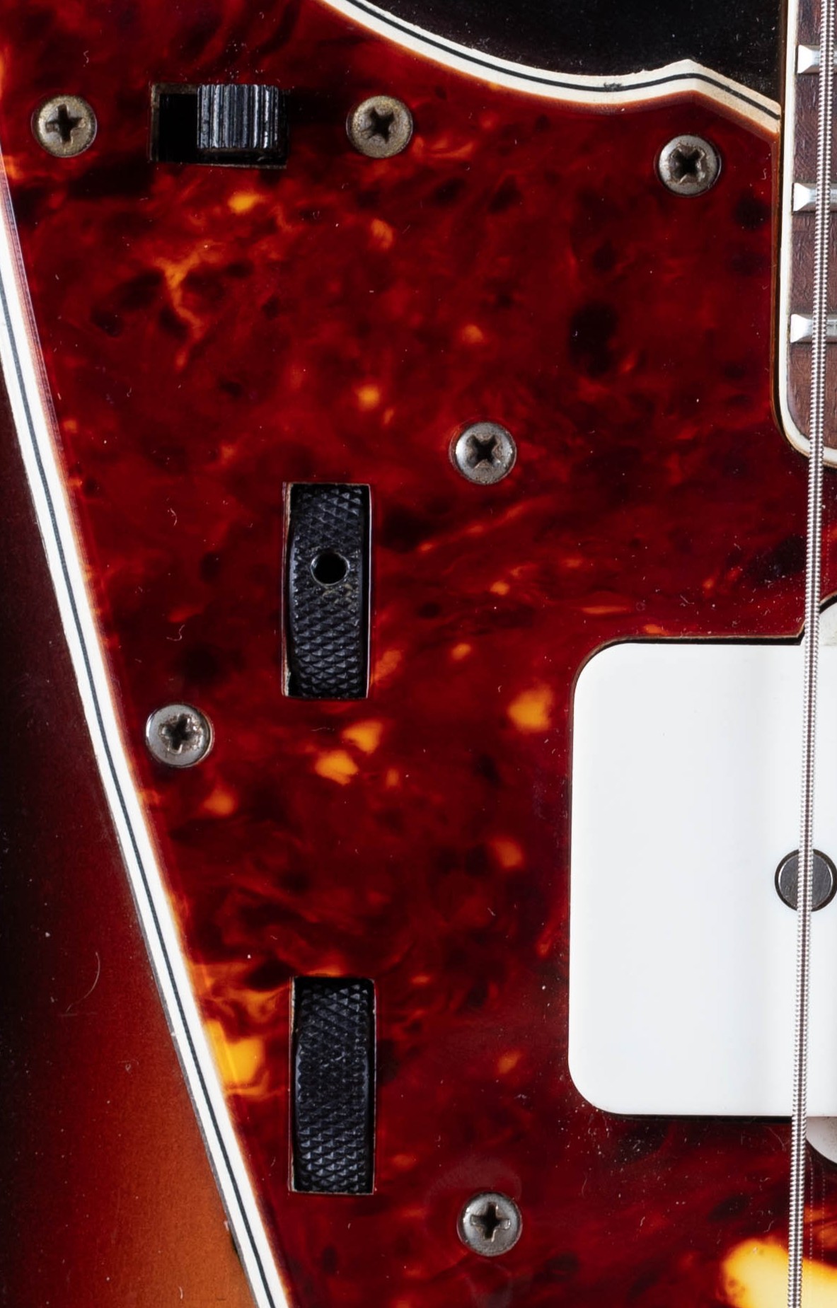 Fender Jazzmaster rhythm circuit slide switch and roller knobs — upper bout rhythm circuit with tone and volume wheels, chrome plate, pre-CBS lead-rhythm switching system