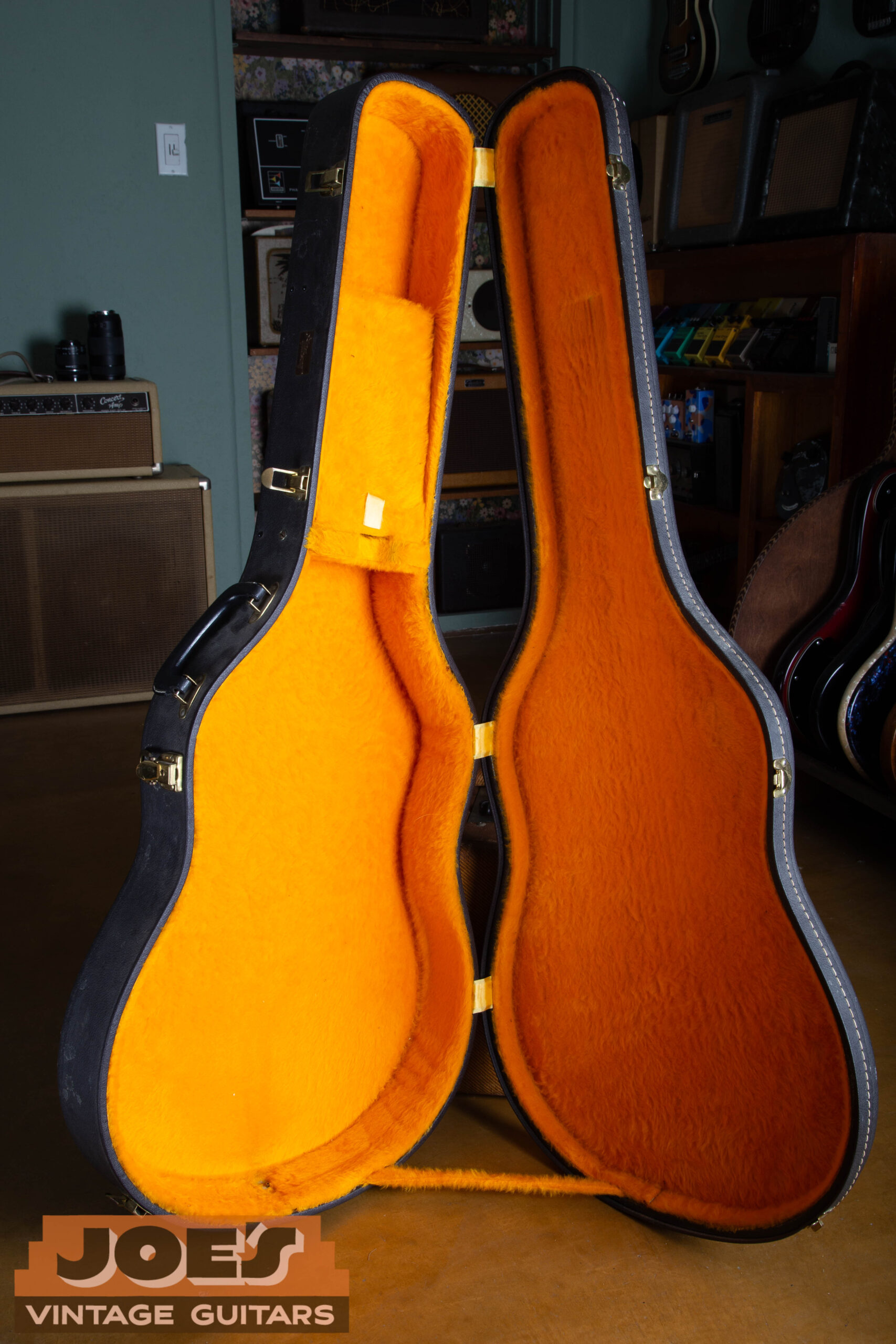 1966 Gibson ES-335 original case open showing yellow gold plush interior — correct mid-1960s Gibson case with warm yellow lining not crushed velvet
