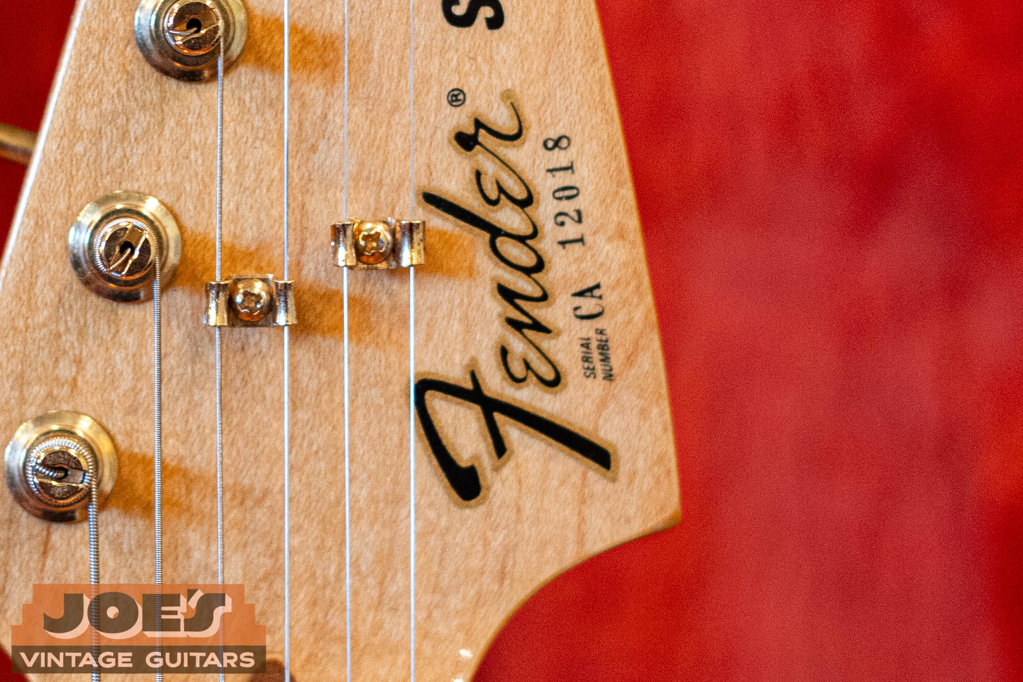 Fender CA-prefix serial number on a limited-edition Gold Stratocaster headstock — rare CBS-era two-letter prefix from the early 1980s