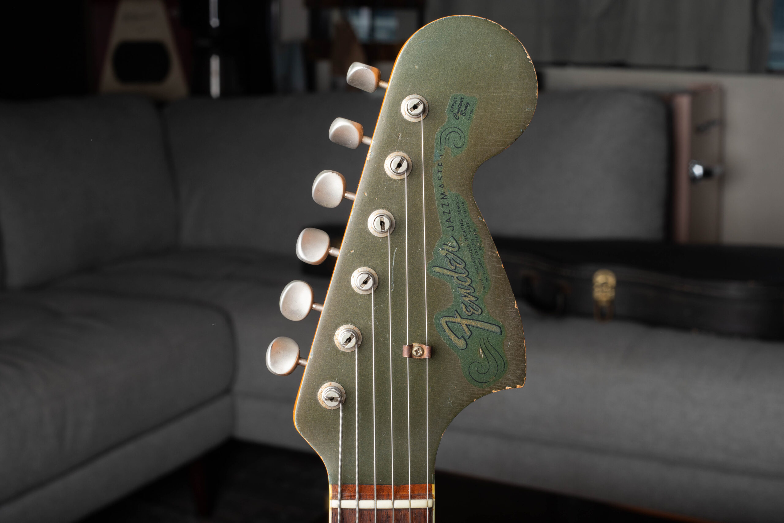 Fender Jazzmaster custom color matching headstock — body color painted headstock on Charcoal Frost Metallic Jazzmaster confirming factory custom color specification