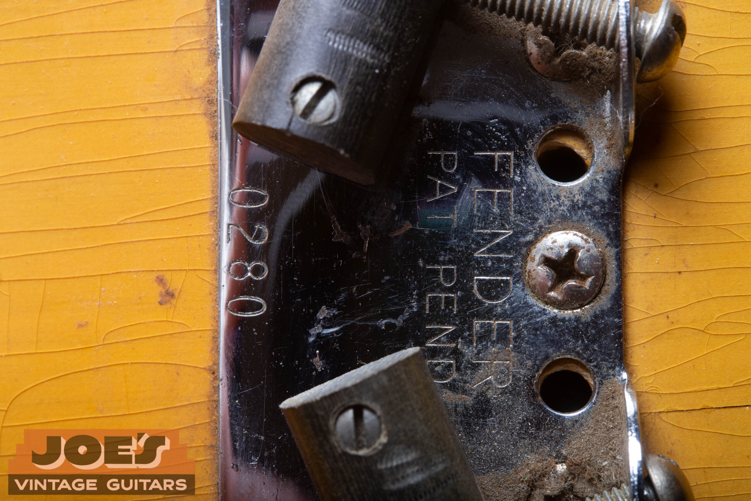 Fender Precision Bass bridge plate serial number stamped on the original ashtray-style bridge, 1951–1954