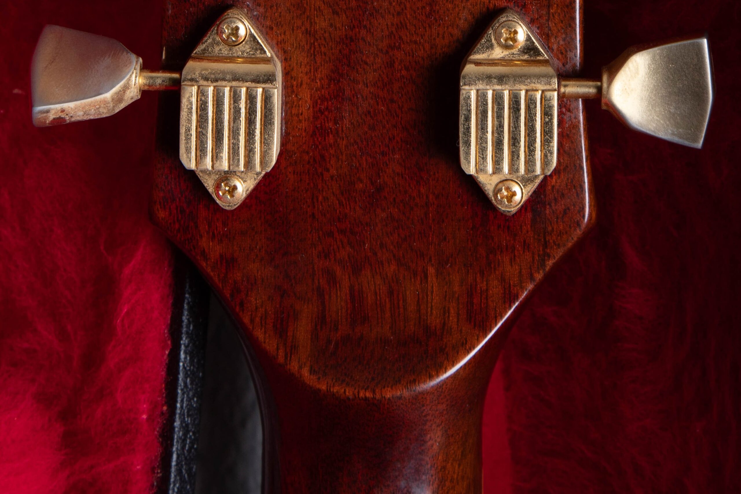 Volute on the back of a 1972 Gibson SG Custom neck — the raised wood reinforcement at the headstock and neck joint used from 1969 to 1981