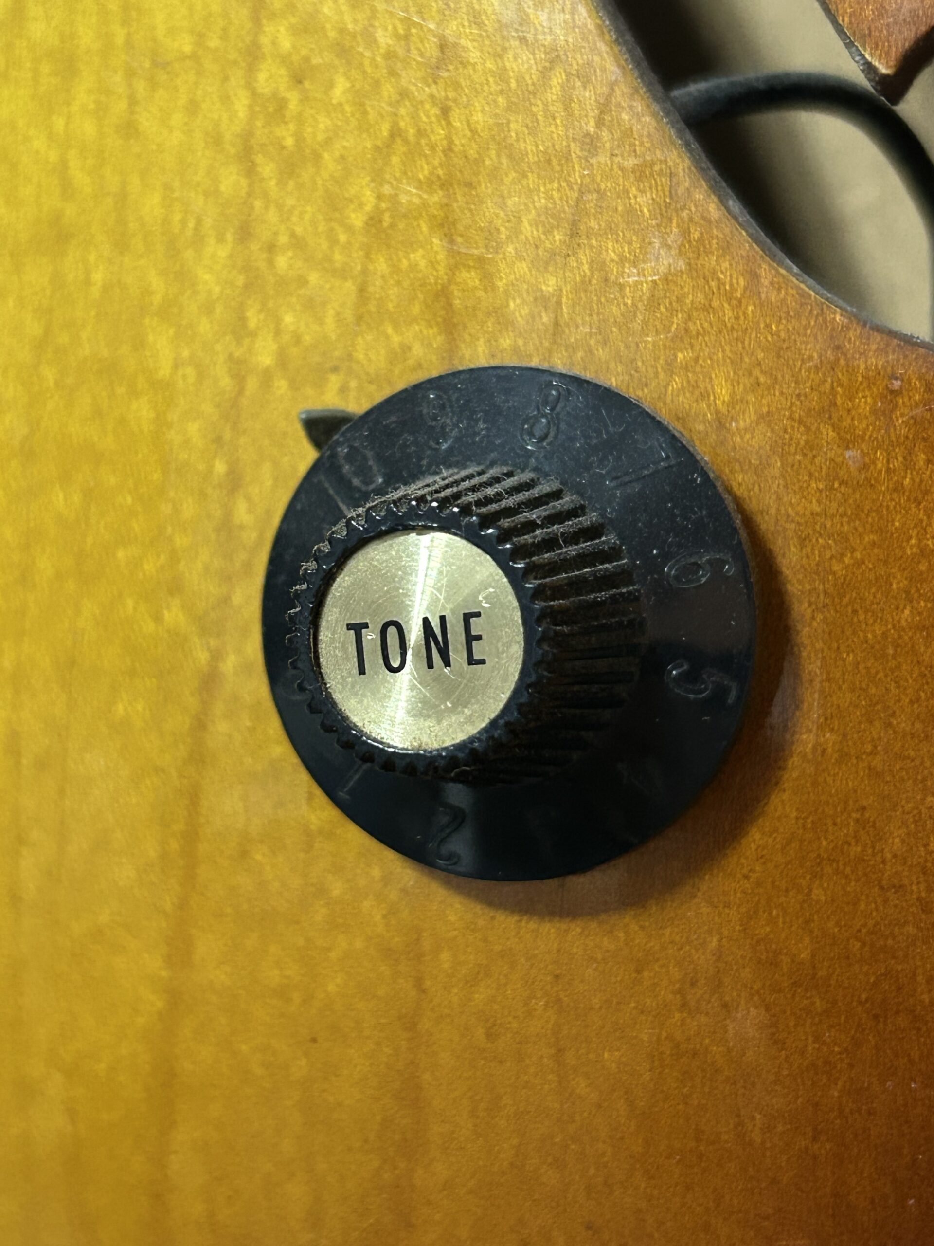 Gibson witch hat knob from 1967 to 1975 — the tall pointed knob with gold or silver top used during the late 1960s and early Norlin era