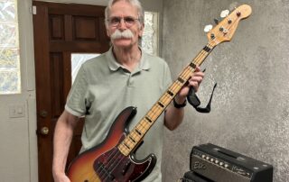 Jim with his 1973 Jazz bass which he has owner for over 40 years.