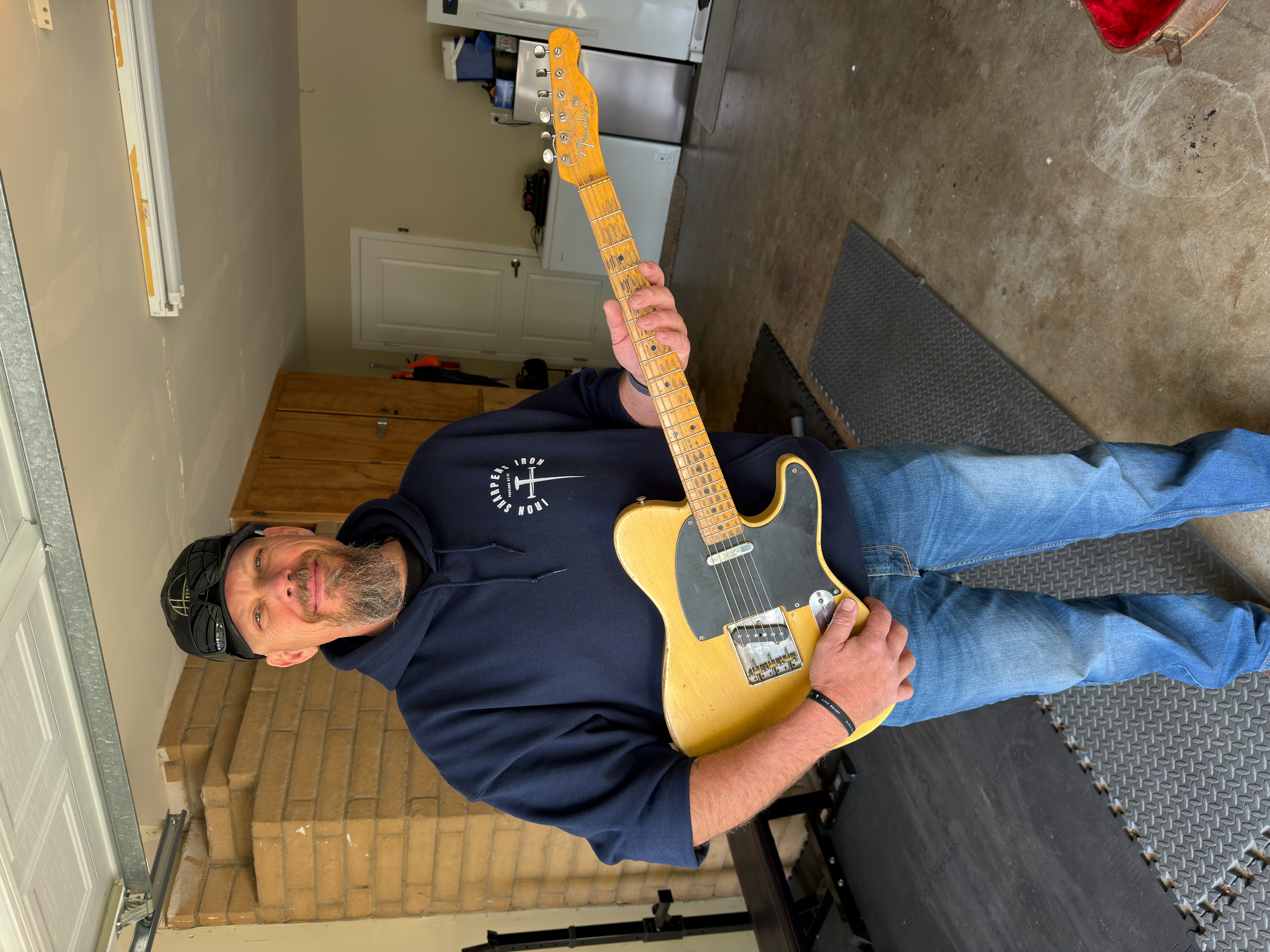 Joshua with his uncle's 1952 Fender Telecaster — sold to Joe's Vintage Guitars, Washington State