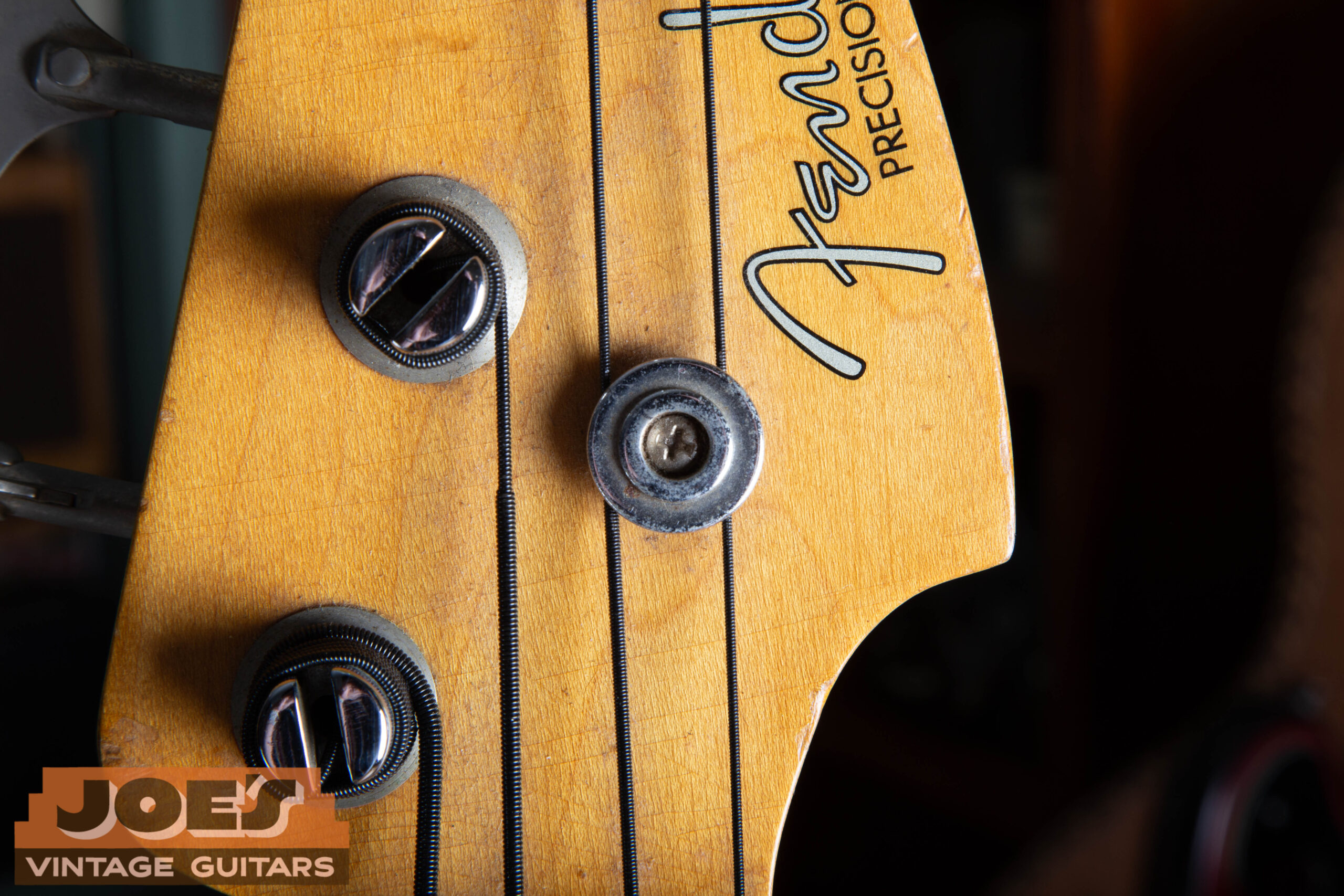 String tree detail on the headstock of a 1959 Fender Precision Bass