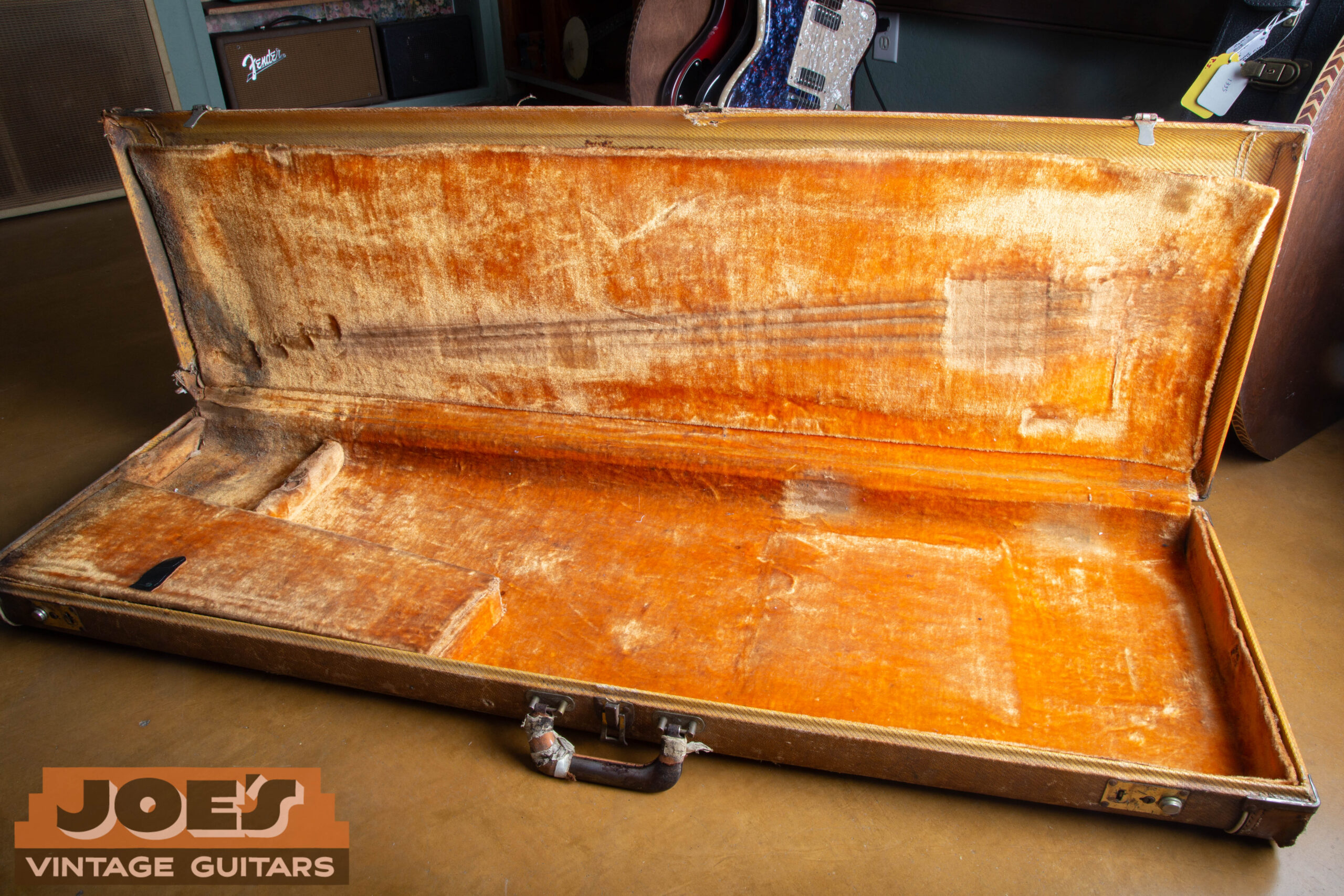 Original tweed case with gold interior for a 1959 Fender Precision Bass
