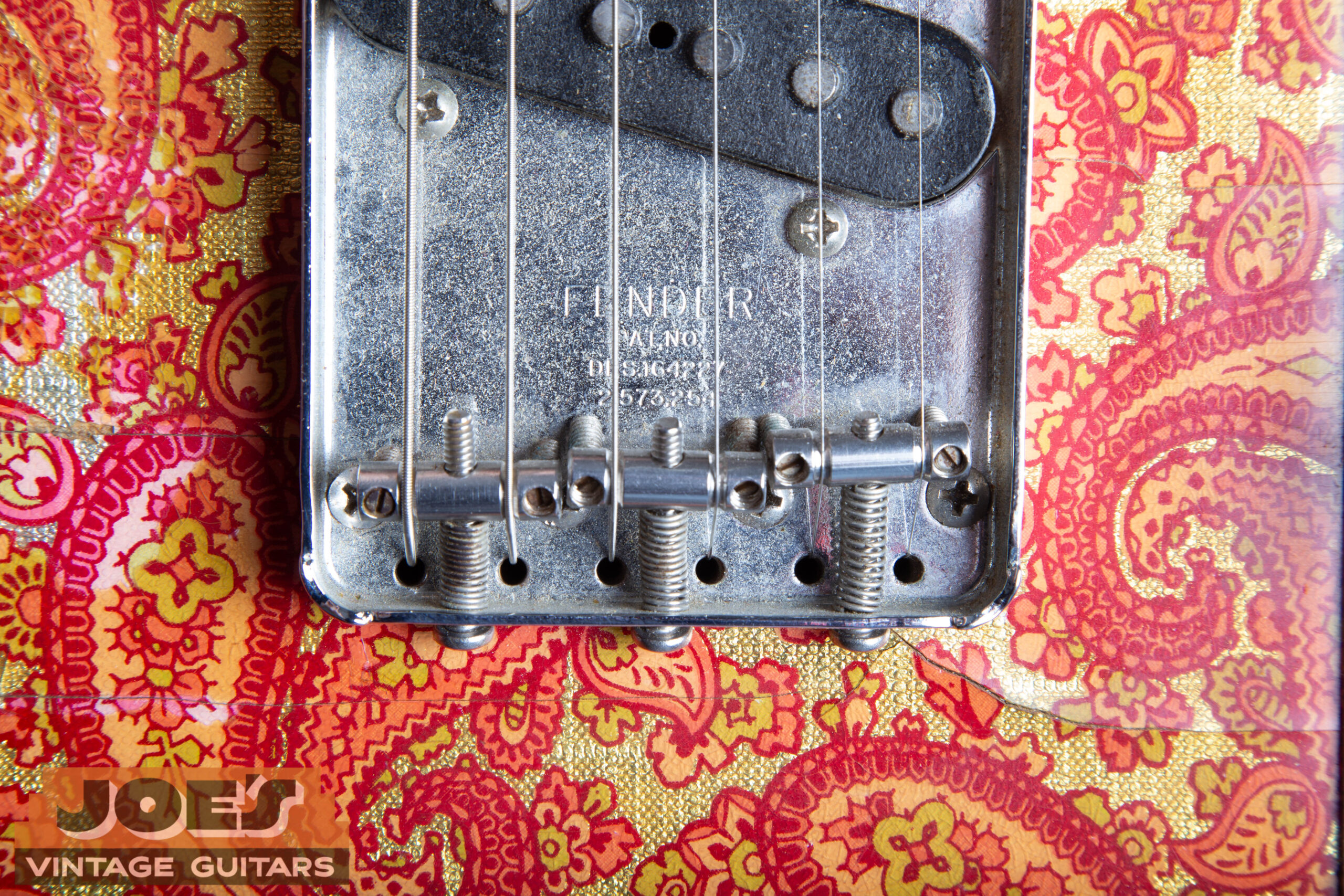 Ashtray bridge plate and threaded steel barrel saddles on 1969 Fender Paisley Telecaster
