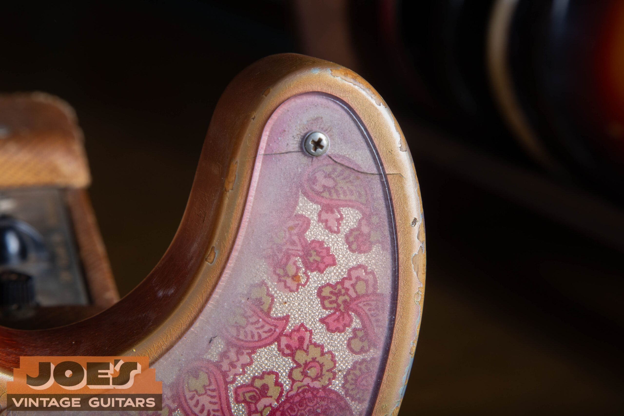 Clear Plexiglass Lucite pickguard on 1969 Fender Paisley Telecaster showing aged pink back-spray