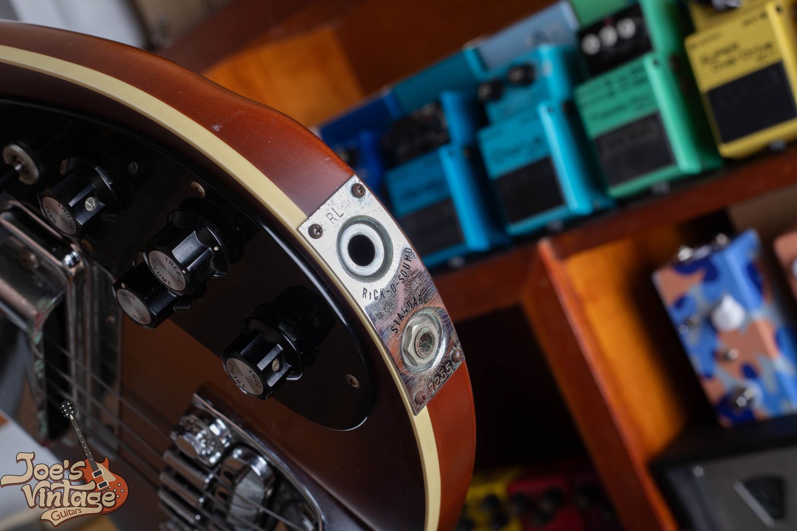 Rickenbacker output jack serial number showing the two-letter year and month code used from 1961 to 1986