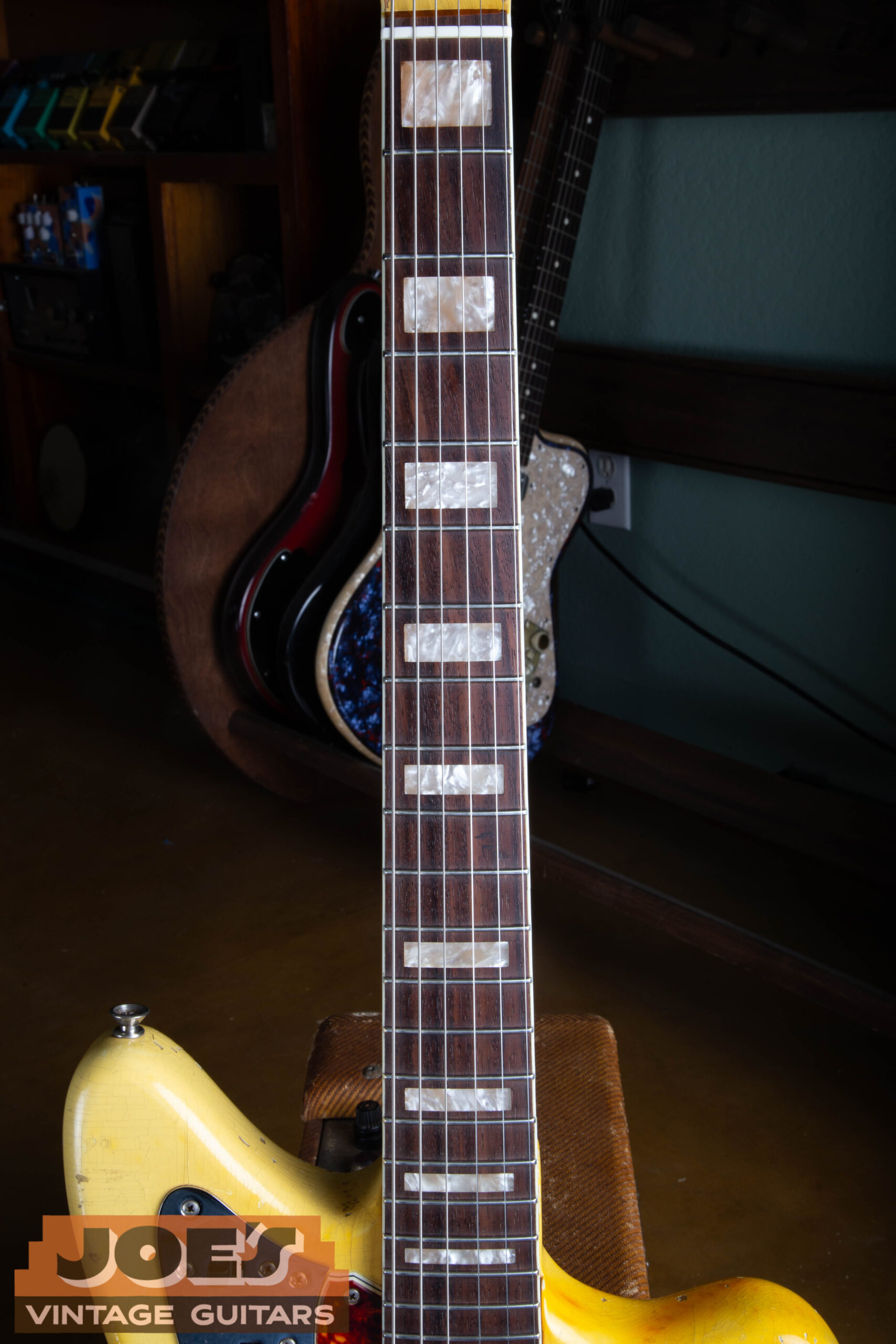 Pearloid block fingerboard inlays on a 1966 Fender Jaguar in Olympic White
