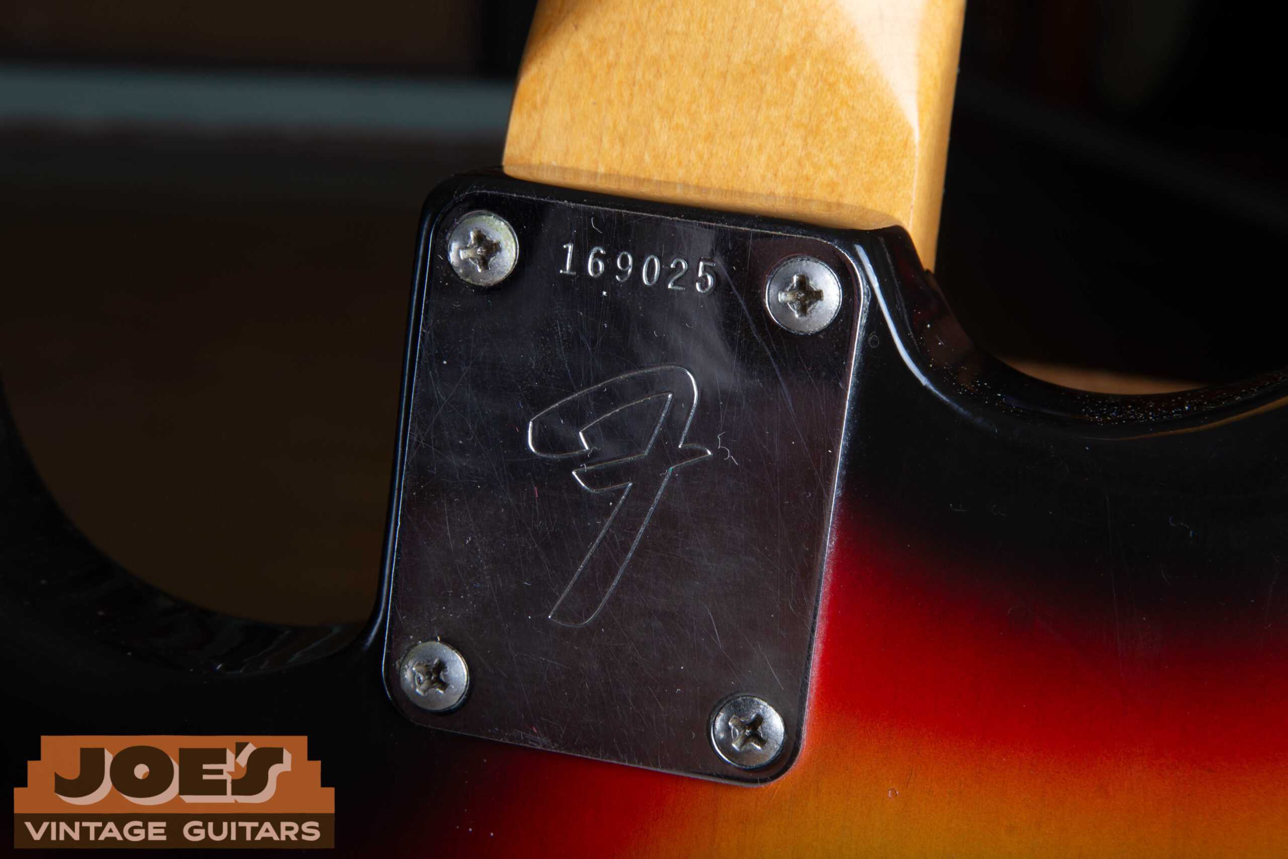 F-stamped four-bolt neck plate on a 1966 Fender Stratocaster with serial number 169025